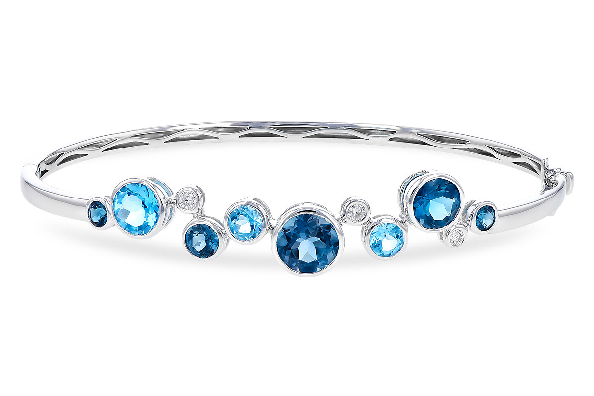 M328-18757: BANGLE 3.95 TW BLUE TOPAZ 4.06 TGW